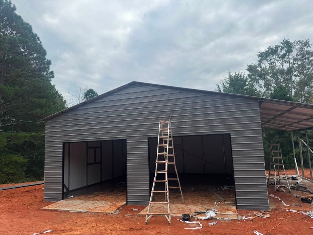 Open steel frame and vertical roof panels on a Frontier RV cover during install